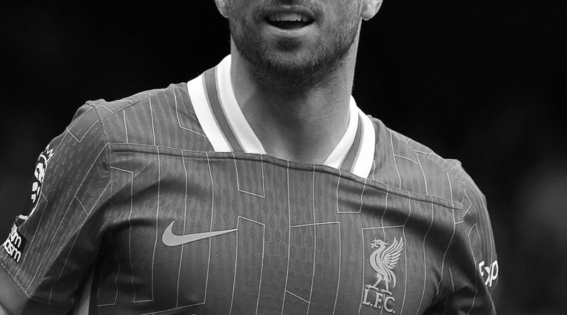 Diogo Jota wearing a liverpool shirt